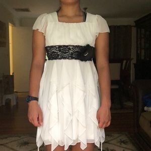 Girls White ruffle dress with black lace detail